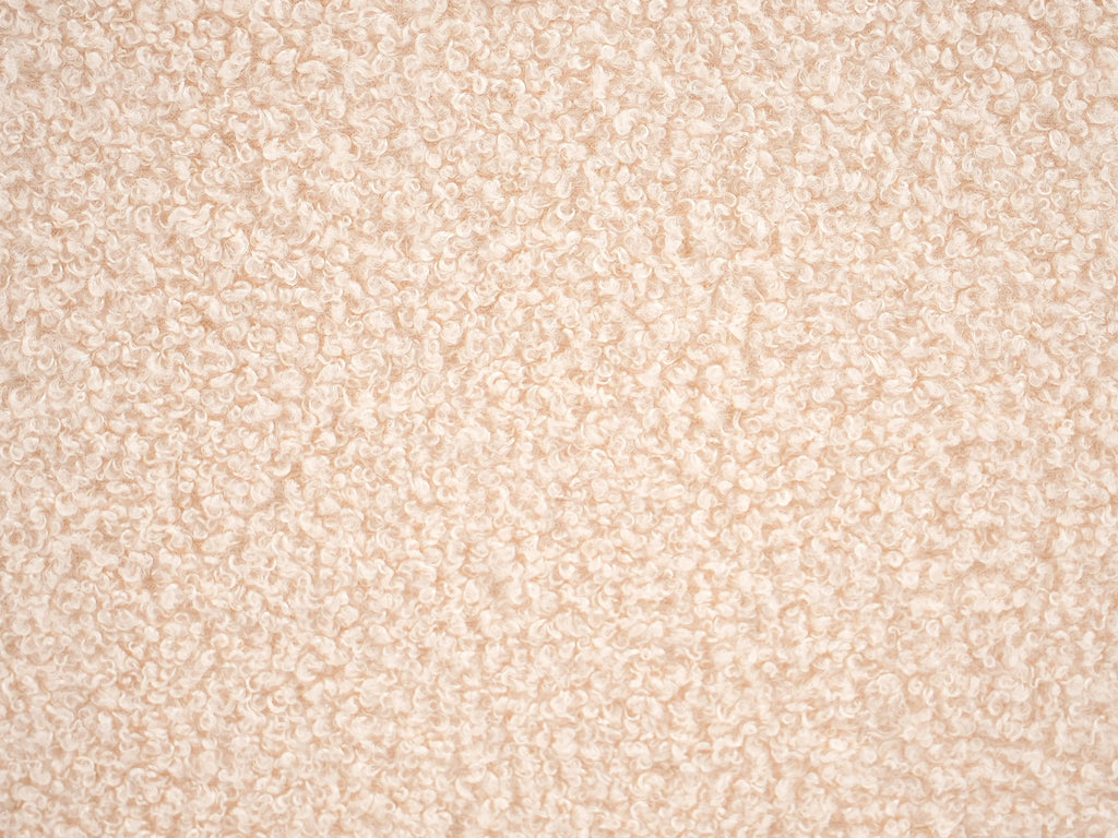 Pouf bouclé beige