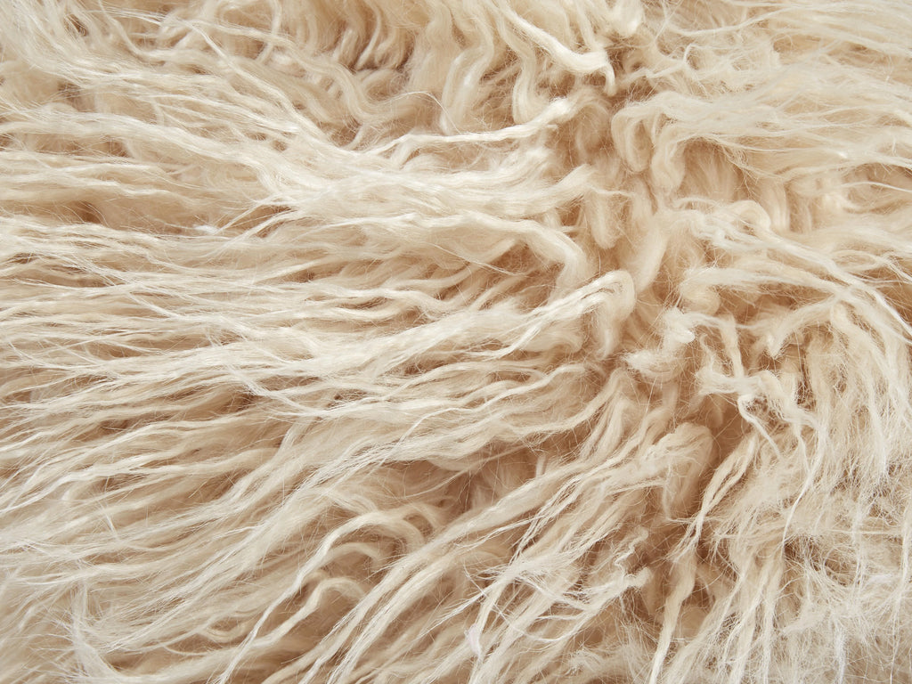Pouf fausse fourrure beige clair